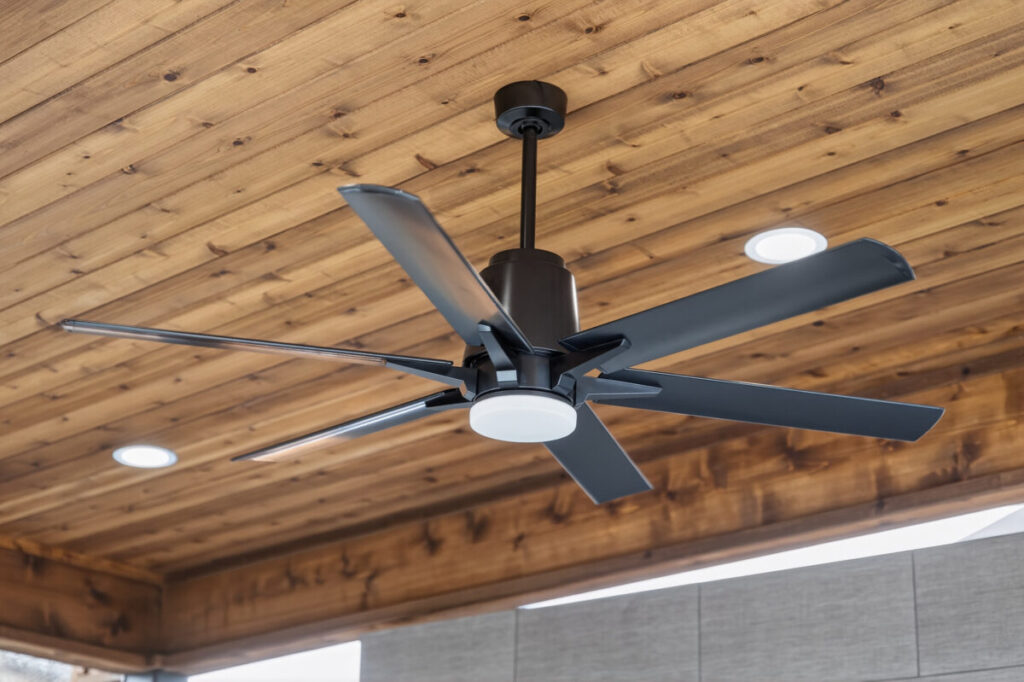 Patio cover with ceiling fan and light fixtures